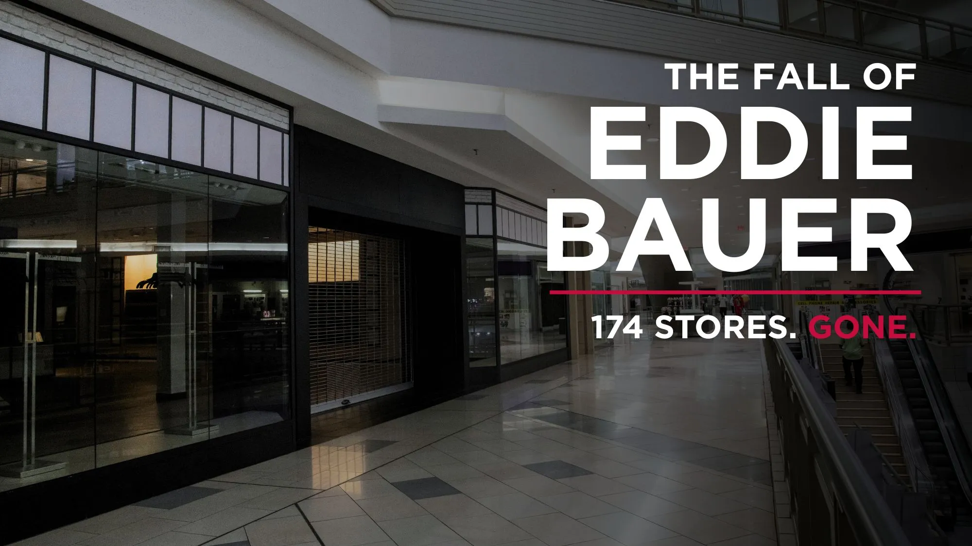Empty shopping mall corridor with storefronts displaying text about the fall of Eddie Bauer retail chain, stating '174 stores gone'