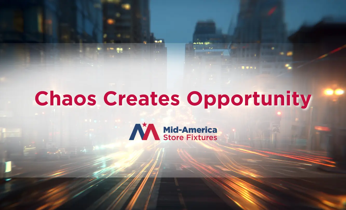 Blurred cityscape background with the quote 'Chaos Creates Opportunity' and the Mid-America Store Fixtures logo.
